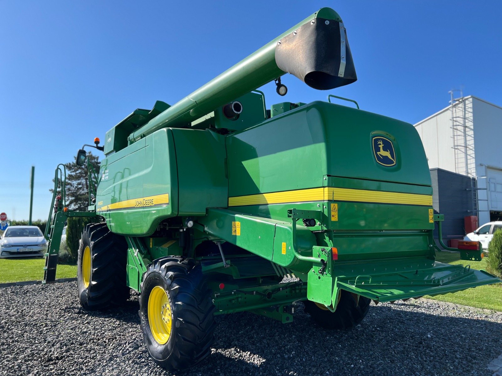 John Deere W650 + Header paioase