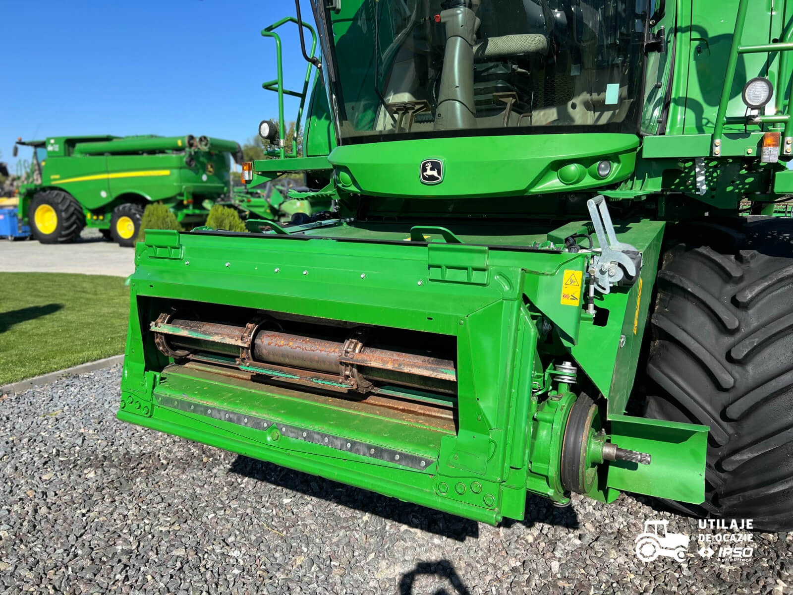 John Deere W650 + Header paioase