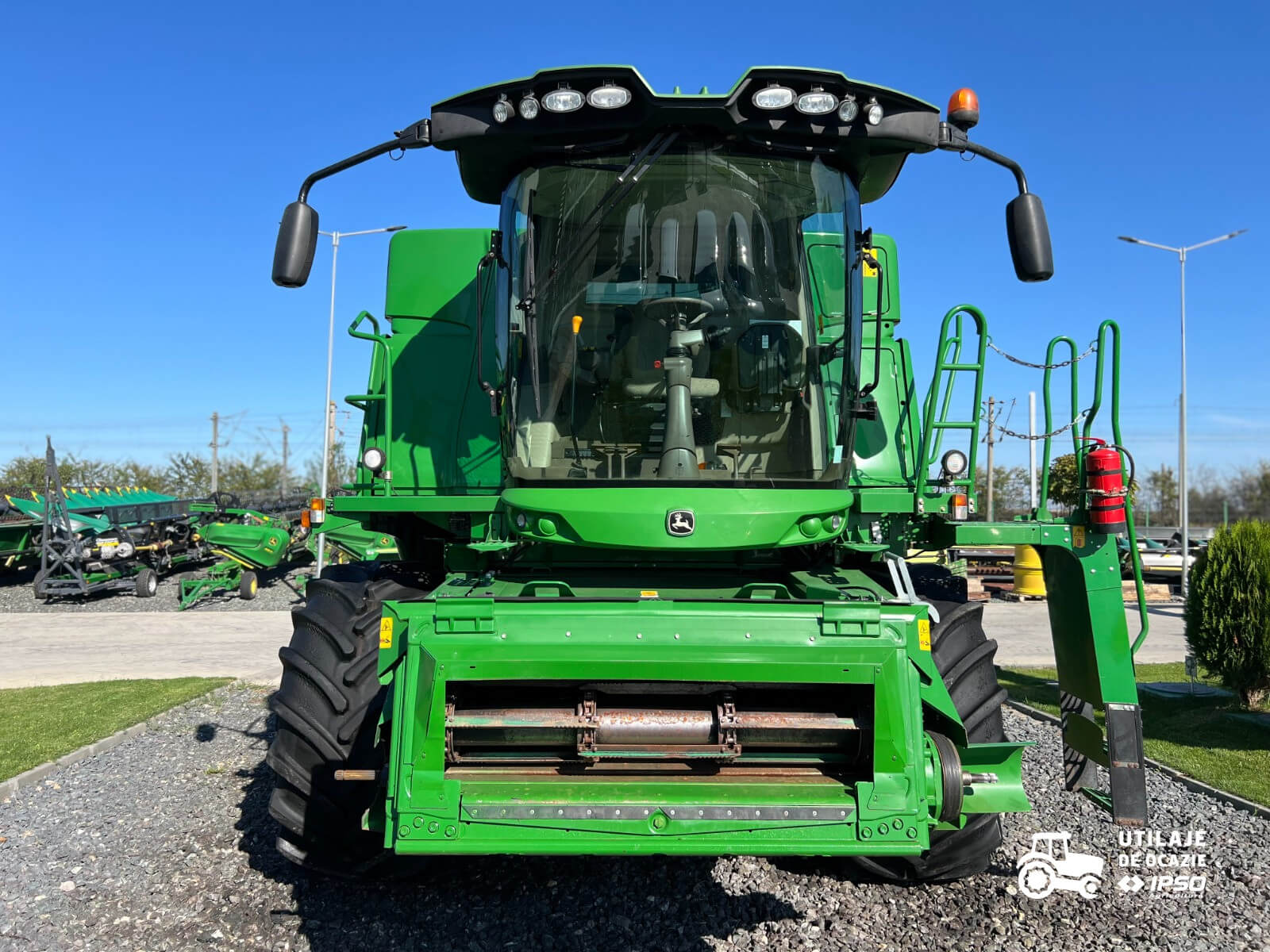John Deere W650 + Header paioase