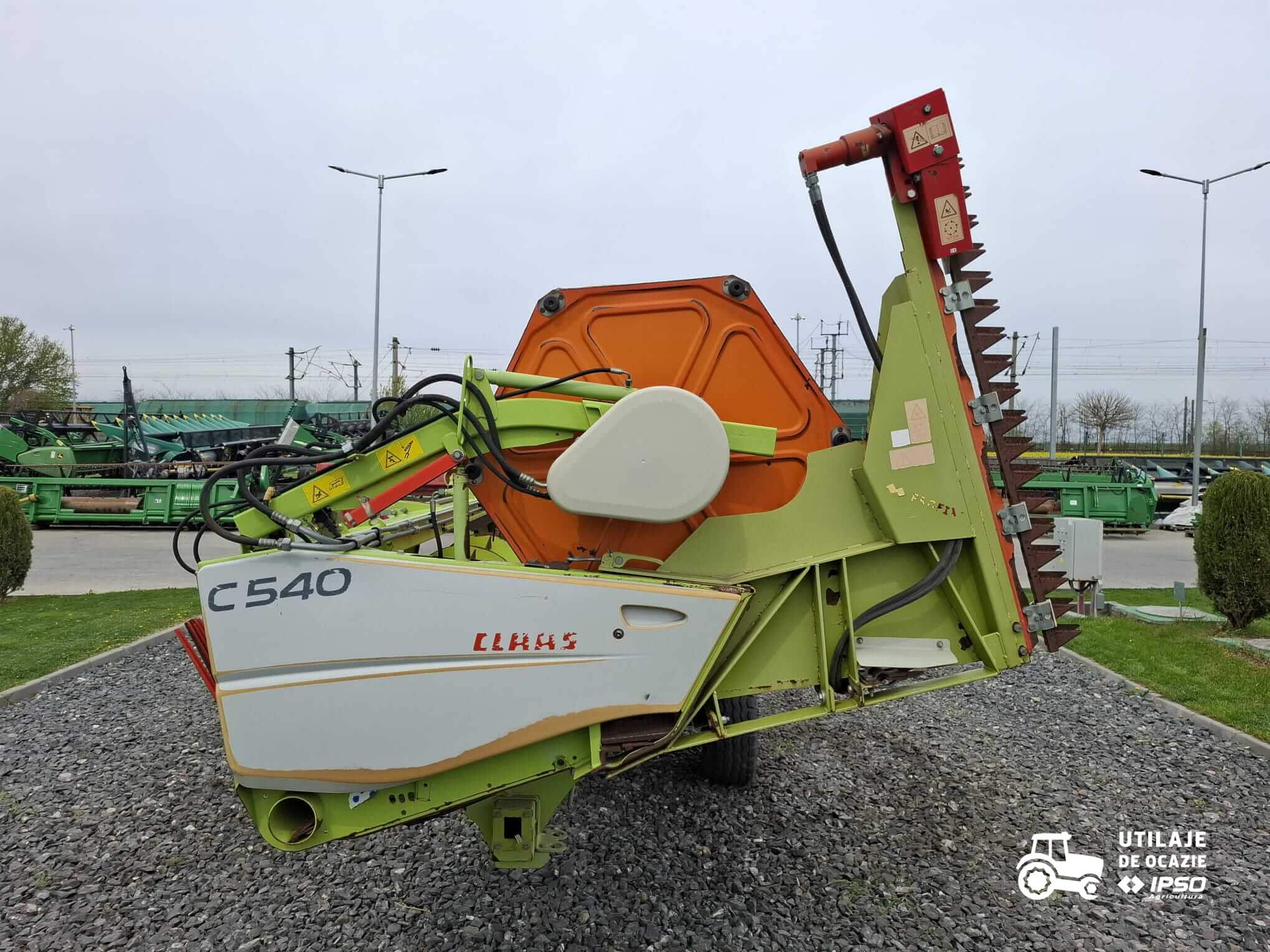Claas Tucano 320 + Header paioase