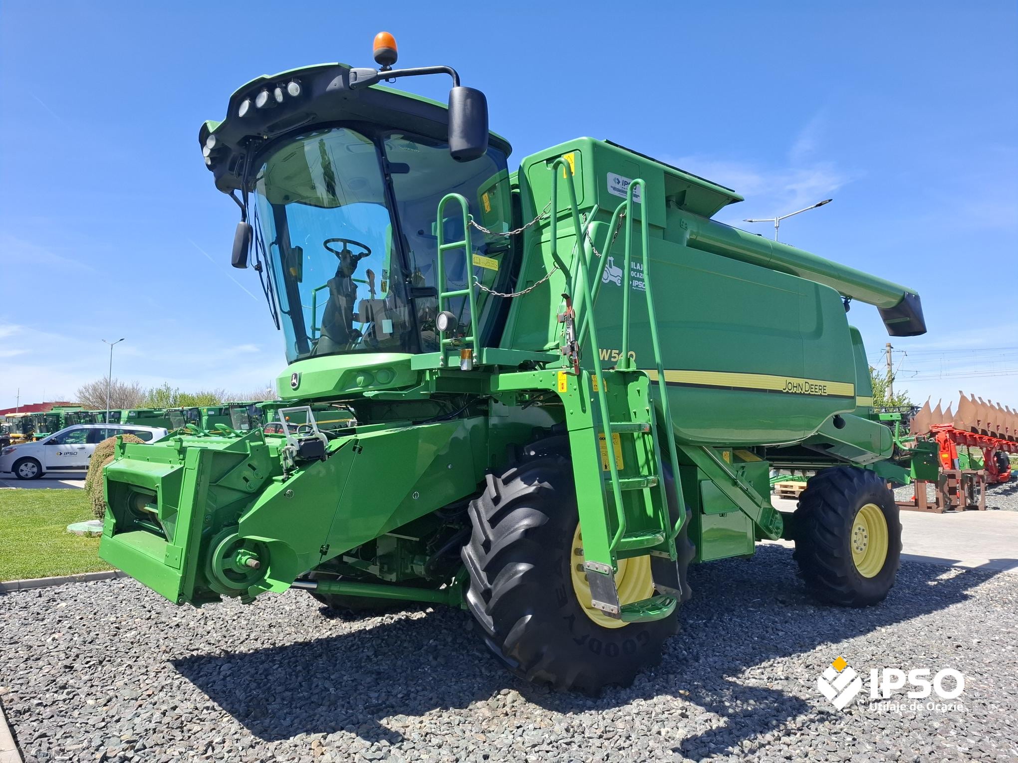 John Deere W540 + Header paioase