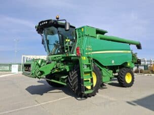 John Deere W650 + Header paioase